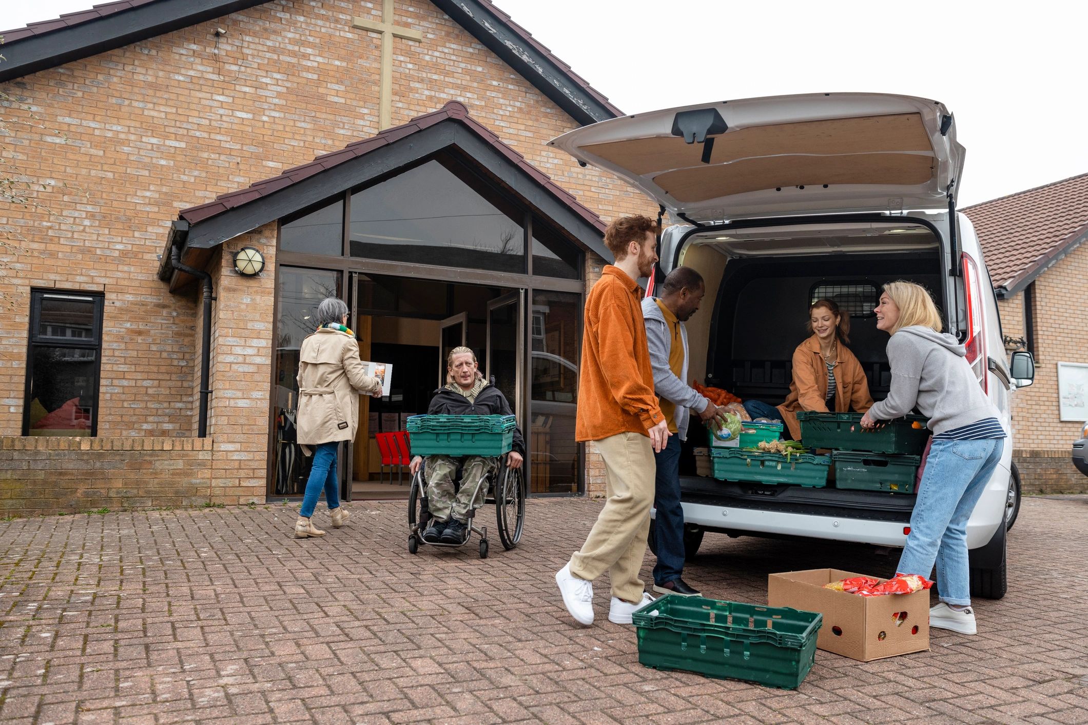 People working together to support food delivery and care services
